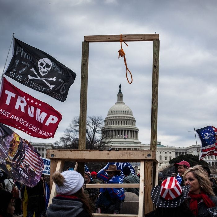 Trump supporters at the US Capitol with their death threat to the rest of US