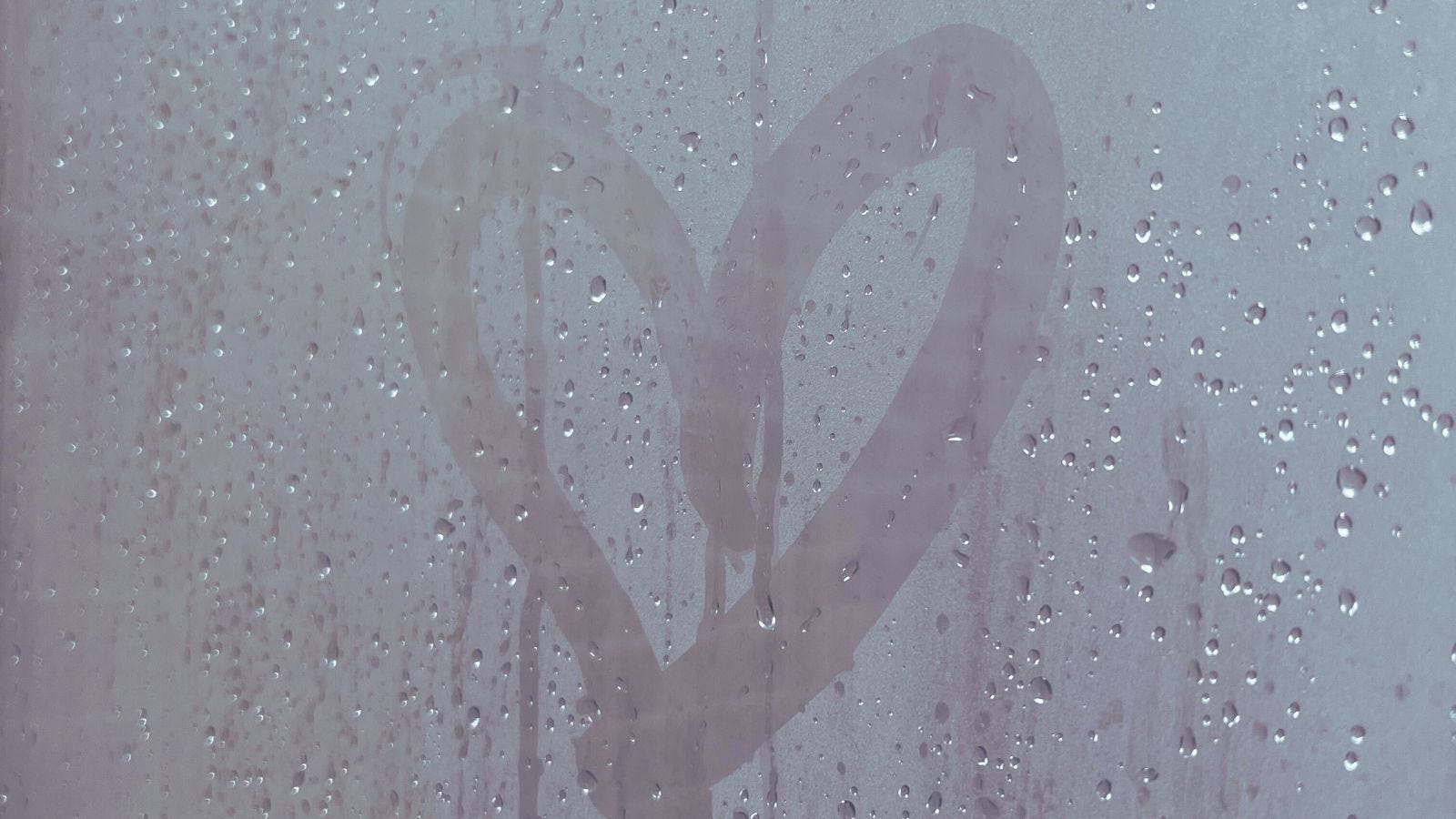 wet steamy glass with heart