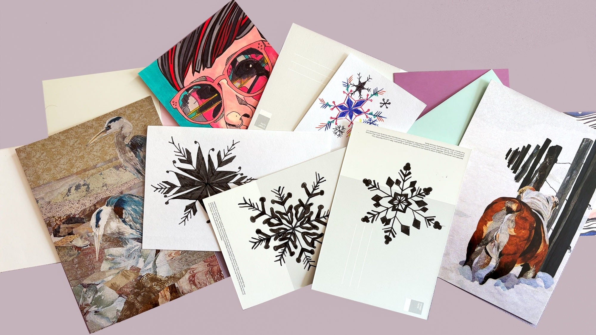 Postcards, some with snowflake art by A. Cowen