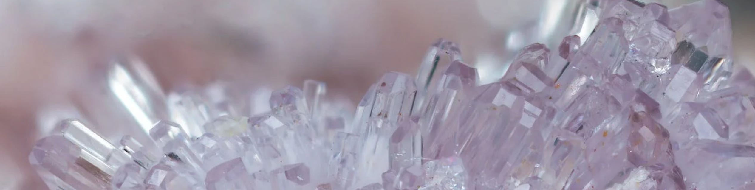 A picture of pinky purple crystals jutting out like a cliff…the crystally cliff of life I guess?