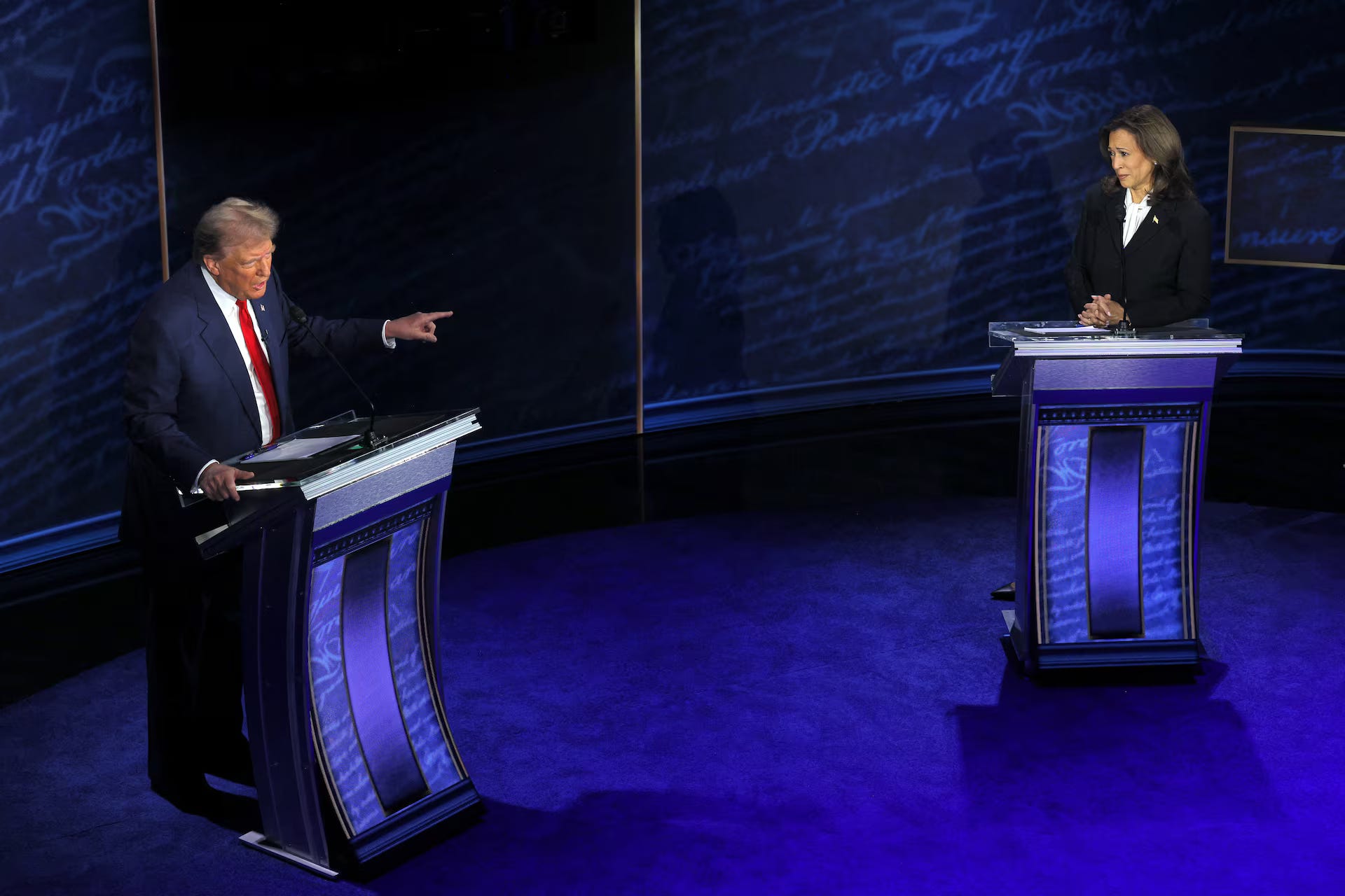 HQ4CIU7GKBPAPPXWJK24GVCS2M.jpg.avifRepublican presidential nominee, former President Donald Trump points toward Democratic presidential nominee, Vice President Kamala Harris. "Our country is being lost, we're a failing nation," Trump said, referring to people crossing into the country illegally. Photo: Brian Snyder/Reuters Pictures.