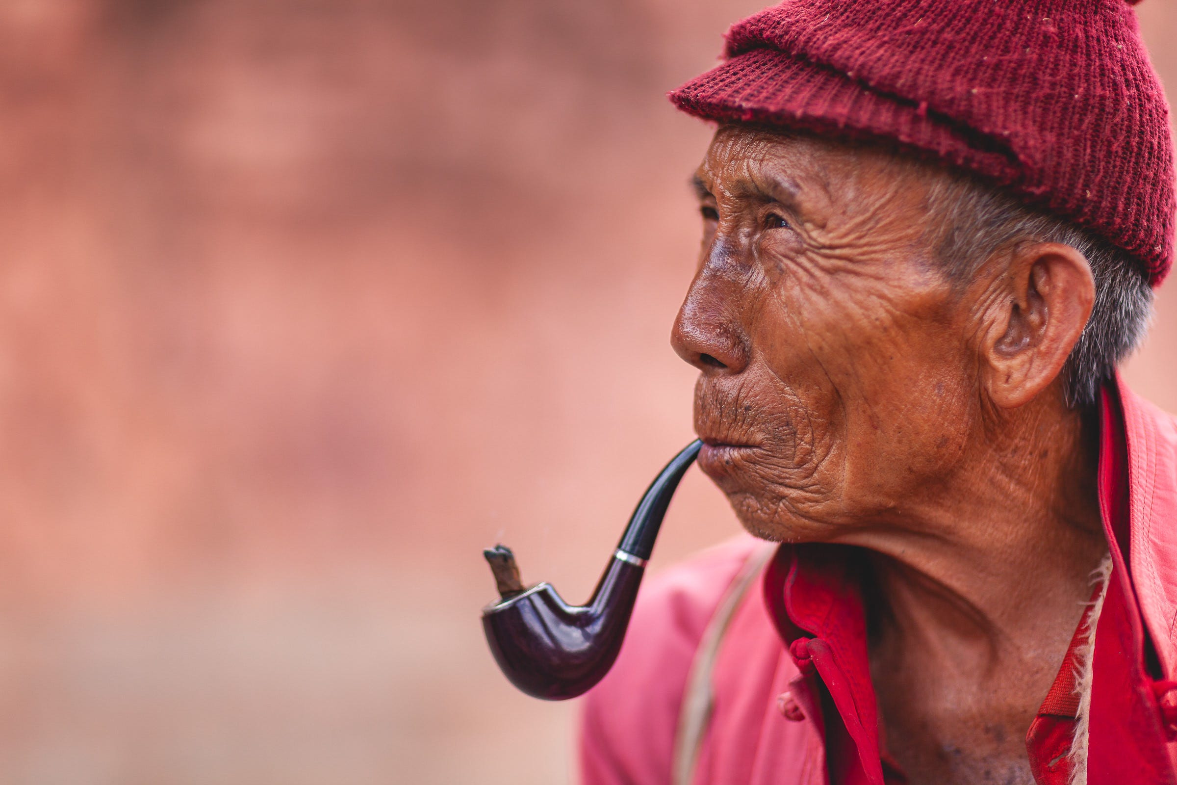 Man & pipe, Dali City, China. 1/2500, ƒ/1.2, ISO 100, 85mm