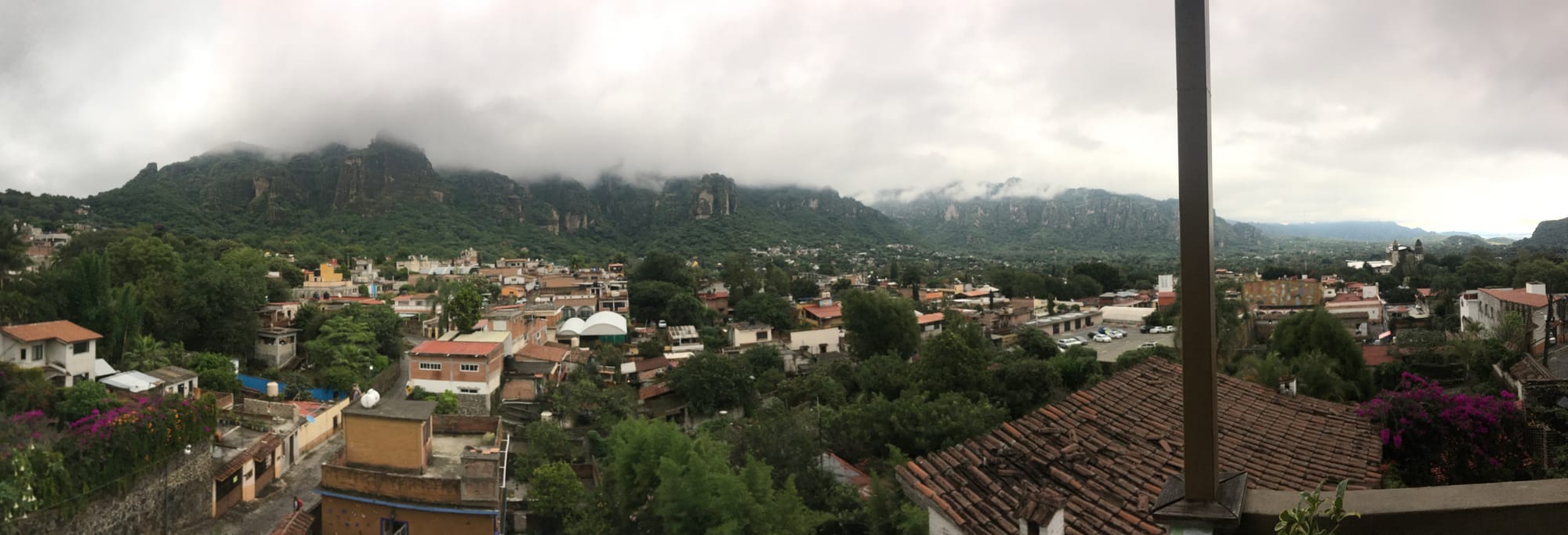 The magical city of Tepoztlán. Somewhere in the wisps of clouds, a pyramid is hidden on top of the mountain.