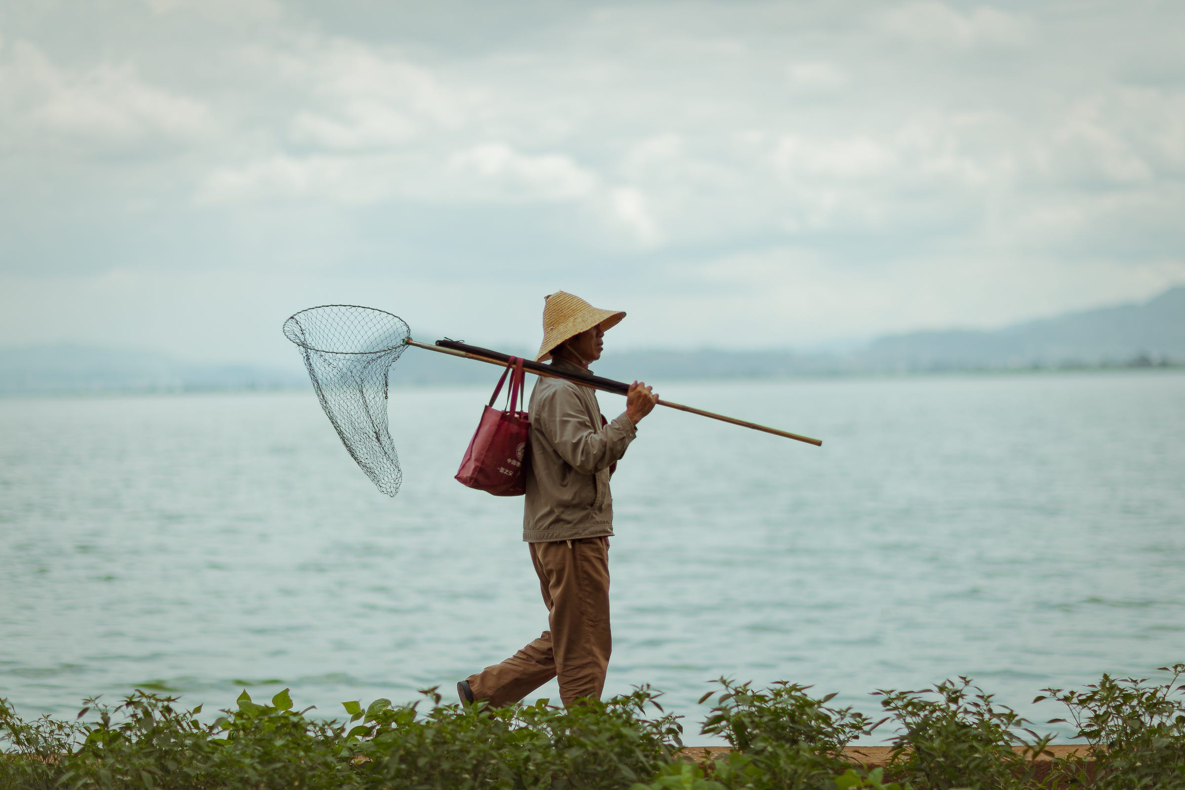 Fisherman, Xishan, China. 1/8000, f/2, ISO100, 85mm