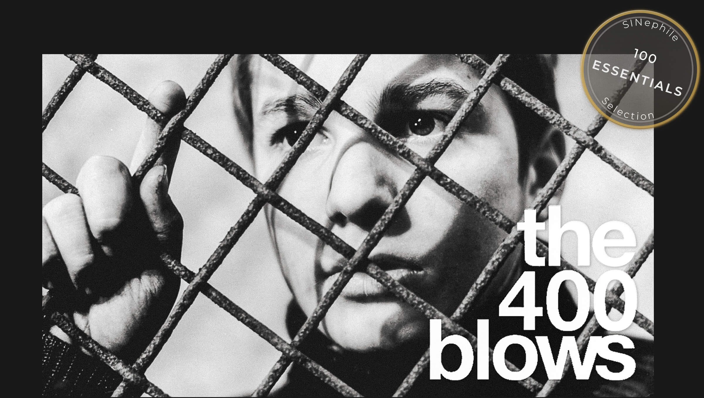 Close-up of a boy’s face seen through a chain-link fence, his fingers gripping the wire as he stares out with quiet defiance. Overlay text reads “The 400 Blows,” with a gold-rimmed SINephile 100 Essentials badge in the corner.