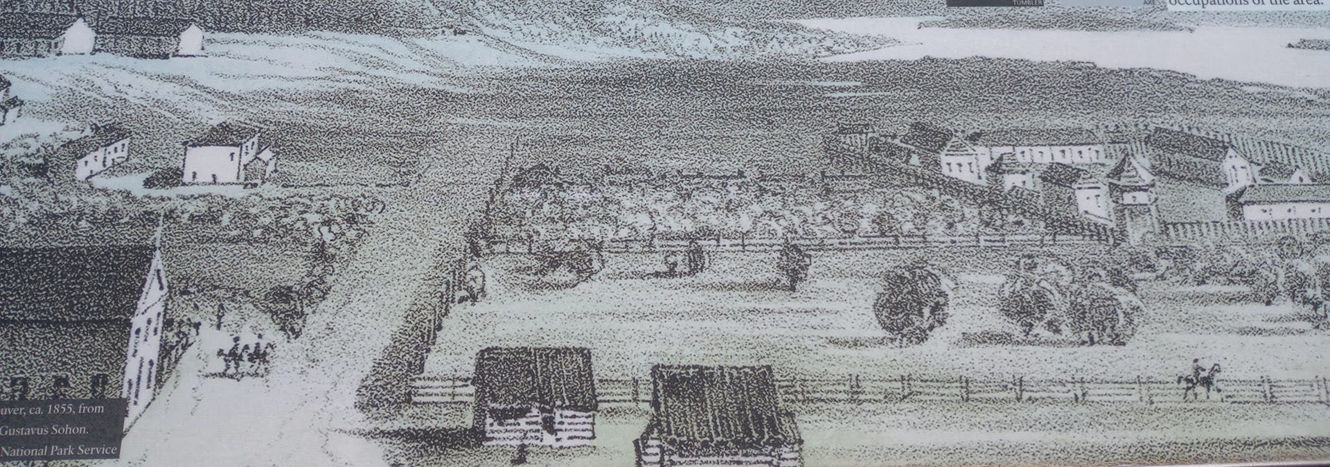 19th century drawing of Fort Vancouver, surrounded by very loose fence, gardens, and homes of less importamt employees