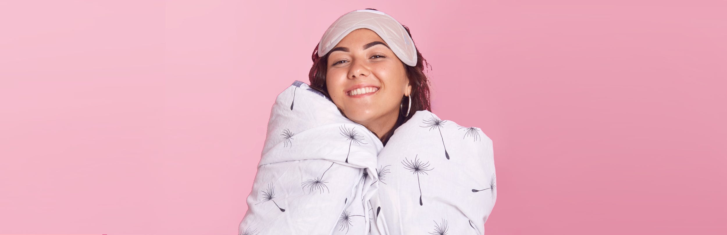 Woman looking comfy wrapped up in a blanket like a human burrito