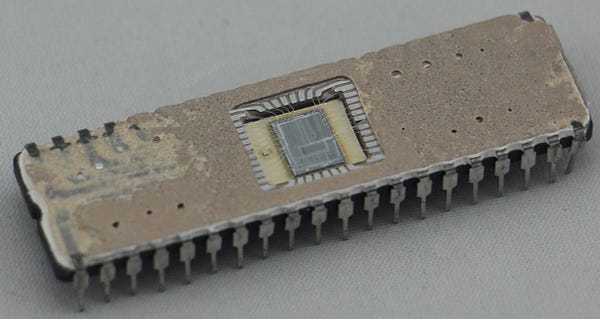 Opening the ceramic package of the Intel 8087 chip reveals the silicon die inside.
