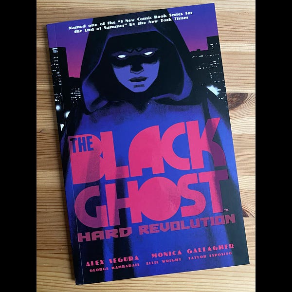 Photo of the Black Ghost: Hard Revolution trade paperback with an illustration of the Black Ghost by Greg Smallwood