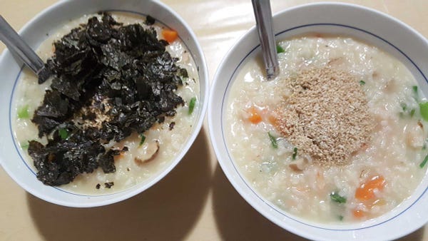 Saeu-juk: Korean rice porridge recipe from Maangchi. Recipe made from YouTube instruction on her channel.

Shrimp, rice, garlic, carrot, green onion, egg, roasted sesame oil, roasted sesame seeds, roasted seaweed.

This was minus the egg and added shiitake mushroom stalks.