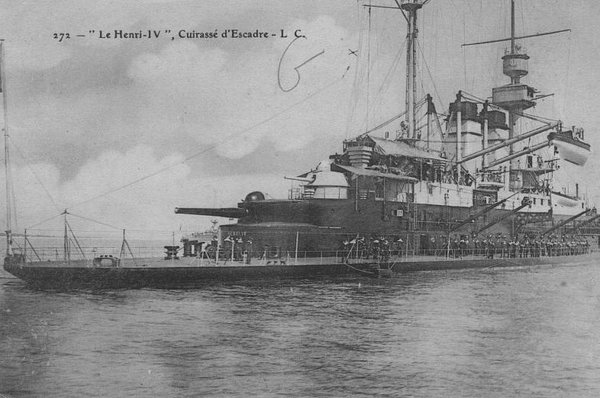 Postcard of Le Henri-IV, Cuirasse d'Escadre. To be fair it's quite fetching, apart from the non-sensically low freeboard aft (Bertin would happily have had the same at the for'ard end if he wasn't sane enough to realise that would lead to submarine operations). The superstructure is almost comically narrow, so the ship's boats are cantilevered out a bizarre amount to clear the hull.