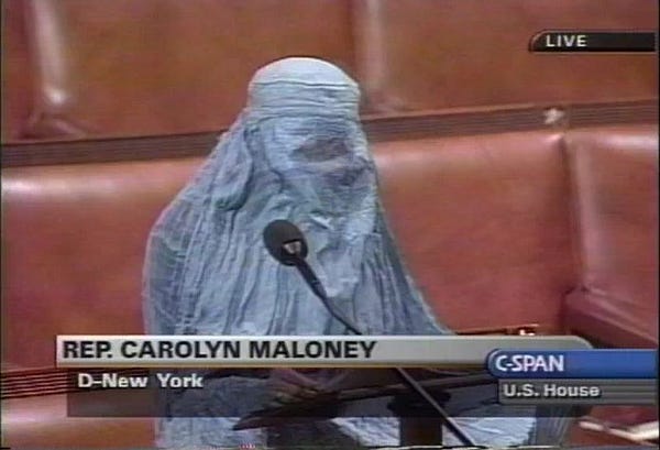 Carolyn Maloney wearing a burqa on the floor of the House of Representatives in a speech she gave on October 16, 2001 in support of the US invasion of Afghanistan