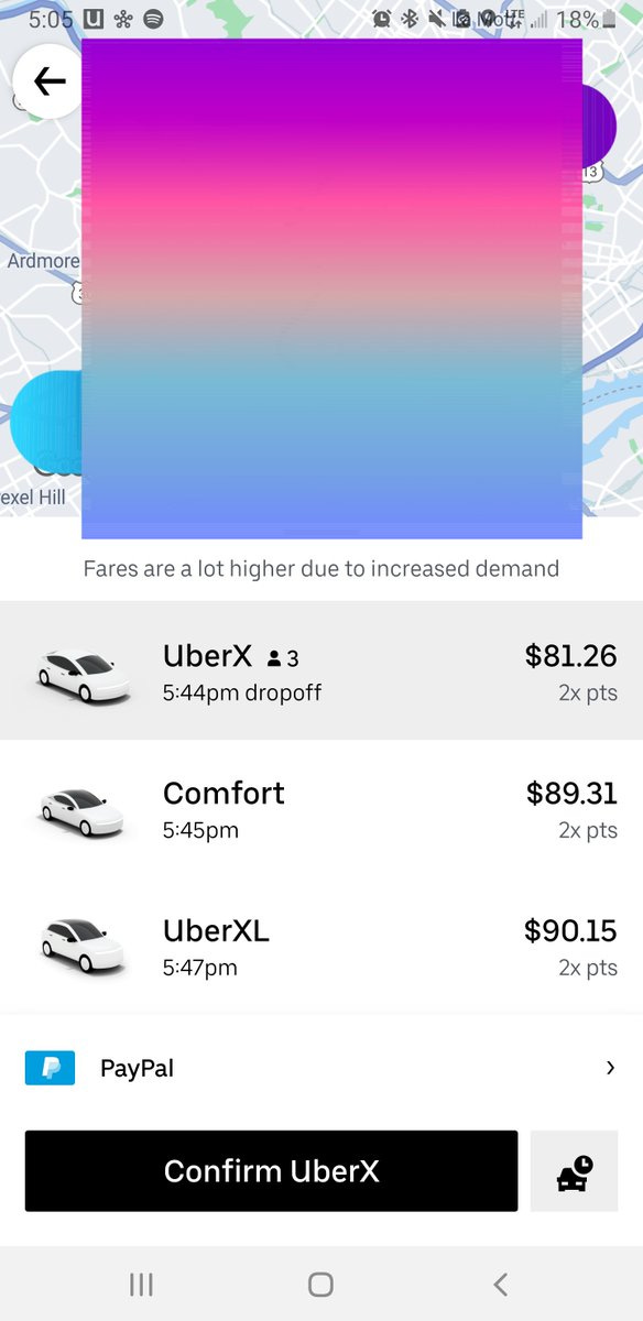 A phone screenshot of a Uber ride request. The battery level is at 18% and the price of the Uber rides are as follows: $81.26 for UberX, $89.31 for Comfort and $90.15 for UberXL.