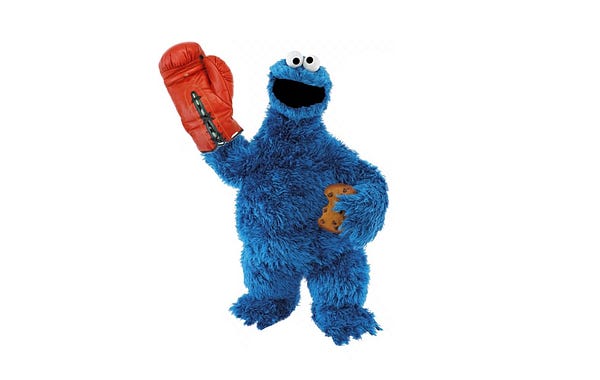 Parody of Cookie Monster from Sesame Street as a boxer with announcer Michael Buffer "bringing him into the ring."