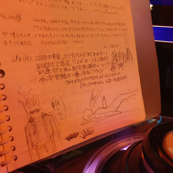 A page from the notebook. On this one, people are using it as a bit of a guestbook, discussing what they did that day at the arcade. There's a sketch of Hatsyne Miku, of a gangster with a bunny head smoking a cigarette, and a guy lying on his back, uh… yelling?