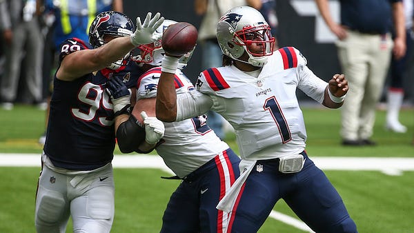 Cam Newton helps Patriots beat Ravens in rain and wind