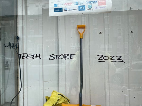 A storefront with “TEETH STORE 2022” written on it