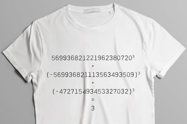 A white T-shirt with the "sum of cubes" puzzle solution for 3 printed on it.