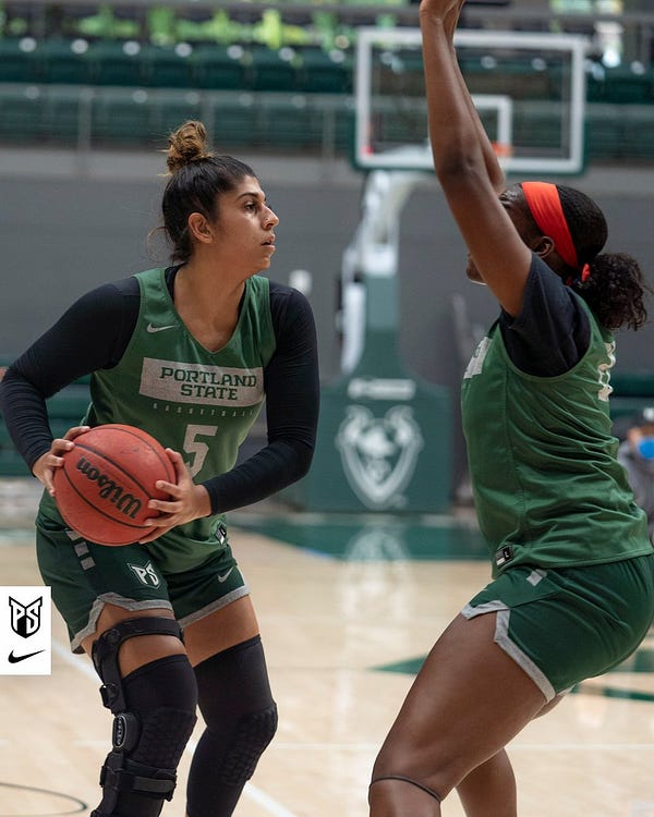Action photo of Portland State women's basketball player Rhema Ogele guarding teammate Savannah Dhaliwal during a team practice.