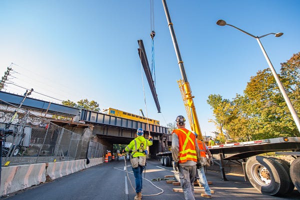 Installing girders at Elmont Station over the Cross Island Parkway