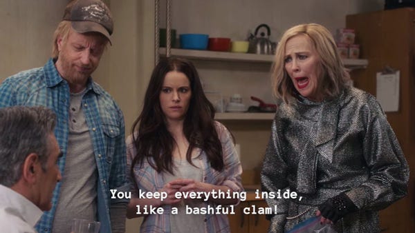 Schitt’s Creek The Hike. Stevie Budd, Roland Schitt, Johnny Rose and Moira Rose at the Rosebud Motel. Moira yelling at captioned “You keep everything inside, like a bashful clam!”
