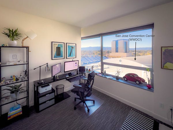 Picture of a home office space, with a view to the San Jose Convention Center.