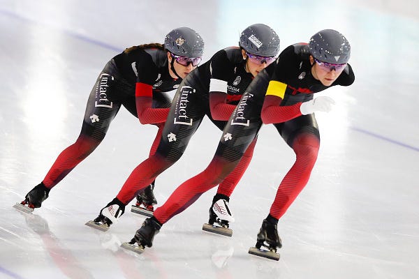 Team Canada with Valerie Maltais, center, Ivanie Blondin, left, and Isabelle Weidemann, right, compete during the women's team pursuit race of the World Cup Speedskating at the Thialf ice arena in Heerenveen, northern Netherlands, Friday, Jan. 22, 2021. (AP Photo/Peter Dejong)