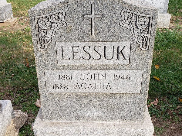 Couple's tombstone that reads:

Lessuk
1881 John 1946
1868 Agatha [blank space for year of death]