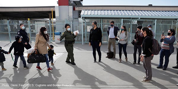 Migrants enrolled in the Migrant Protection Protocols are processed by U.S. Customs and Border Protection officers. 