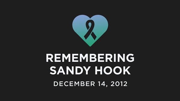 A black graphic that reads "REMEMBERING SANDY HOOK DECEMBER 14, 2012" with the illustration of a heart and a silhouette  of a ribbon in blue and green gradient colored. 