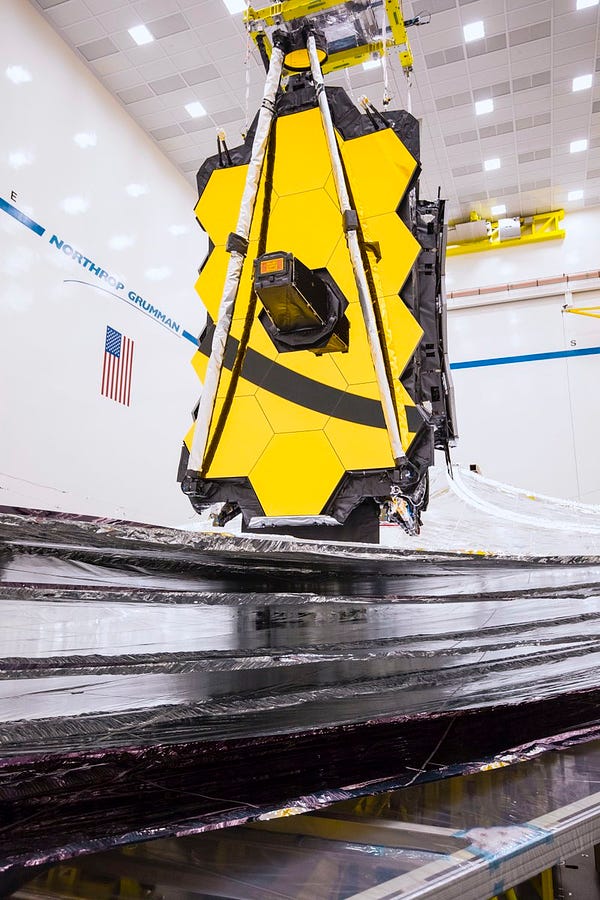 Image from October 2019 after the completion of deployment testing for the Webb telescsope's silver 5-layer, kite-shaped sunshield.