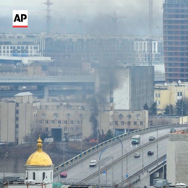 Smoke and flame rise near a military building in Kyiv, Ukraine.