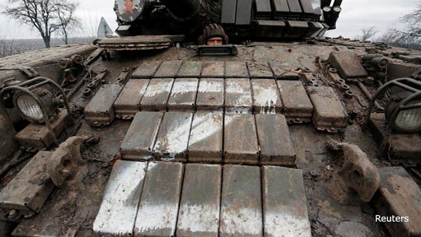 A serviceman of pro-Russian militia is seen inside a tank in the Luhansk region, Ukraine 
