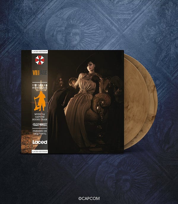 Alt text: The Limited Edition Resident Evil Village double LP vinyl from Laced Records with ochre and black marble discs. The front cover shows Lady Dimitrescu.
