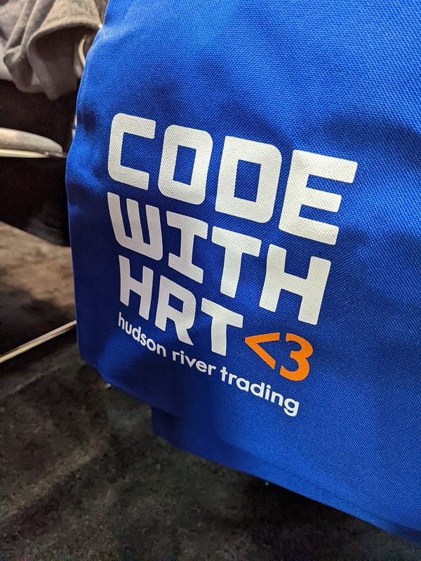a bag that says CODE WITH HRT