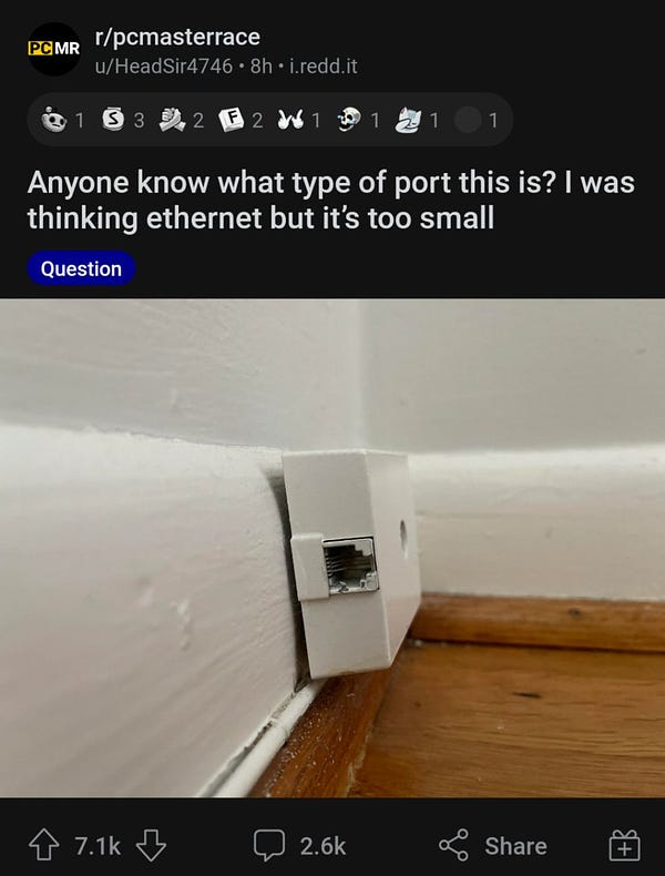 A post on the PC master race subreddit with a picture and the question "Anyone know what type of port this? I was thinking Ethernet but it's too small"

The photo is of a land line phone jack

