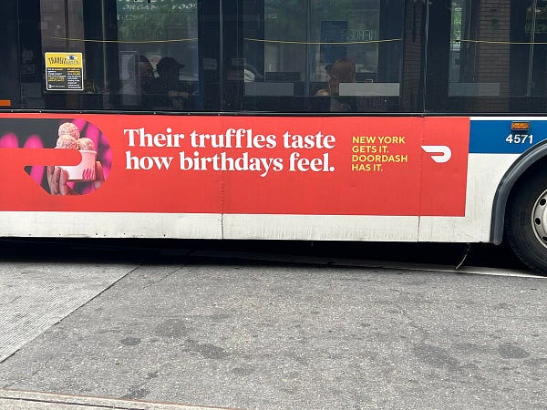 Door dash bus ad “their truffles taste how birthdays feel.”
