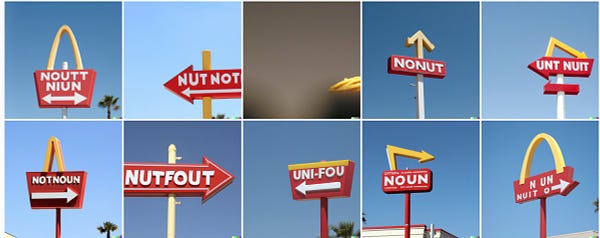 Signs in red and white with arrows and arches. They read variations on "Noutt Niun" and "Nutfout" and "Uni-fou" and "Noun" and "Nonut"
