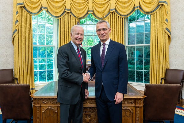 President Biden shakes hands with NATO Secretary General Stoltenberg in the Oval Office