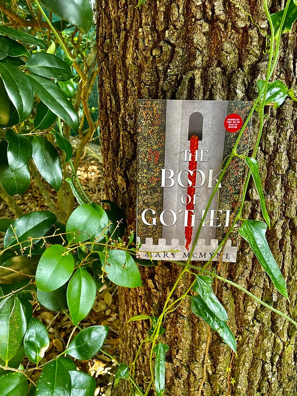 ARC of THE BOOK OF GOTHEL ensconced with some ivy on a tree trunk