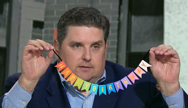 Windhorst holding a happy birthday banner