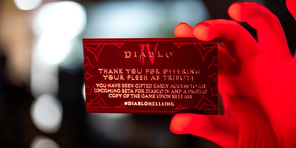 Photo of a card from the event given to every person who receives a Diablo flash tattoo. Text on the card says: "Thank you for offering your flesh as tribute. You have been gifted early access to an upcoming beta for Diablo IV and a digital copy of the game upon release. #DiabloHellsInk"