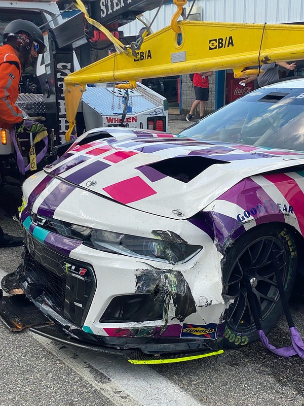 Alex Bowman's damaged front end after being delivered by a tow truck to the New Hampshire garage.
