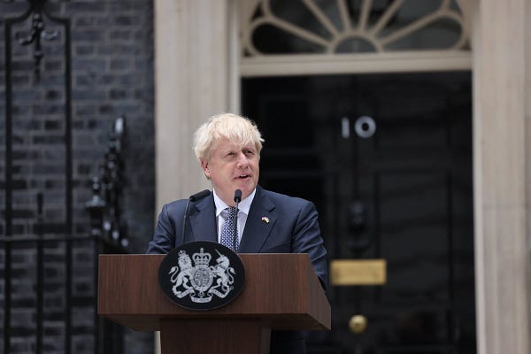 Boris Johnson at a lectern outside the No10 door.