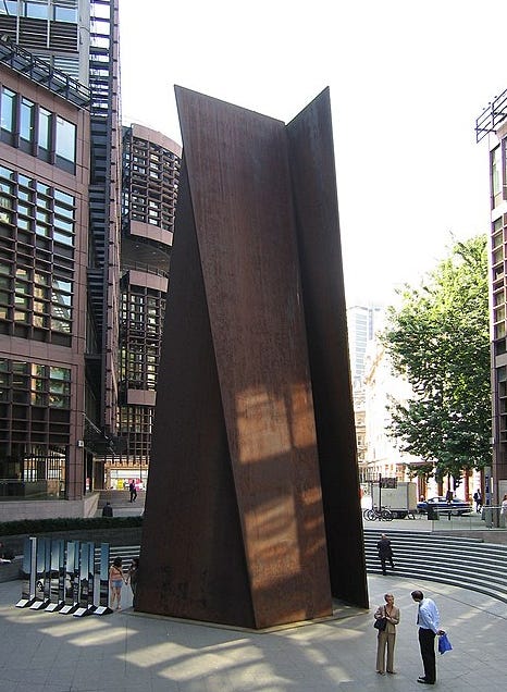 Fulcrum. Fulcrum is a large sculpture by American artist Richard Serra installed in 1987 near the western entrance to Liverpool Street station, London, as part of the Broadgate development. The sculpture consists of five pieces of Cor-Ten steel, and is approximately 55 feet (17 m) tall.Deyan Sudjic, director of the Design Museum, has called it one of London's "design icons"
