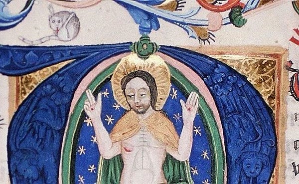 a medieval drawing of Christ on majesty with a drawing in the margin to the top left of a cat liking its butt