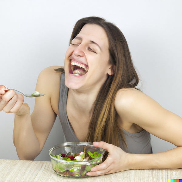 a woman laughs while eating salad, revealing two separate rows of bottom teeth