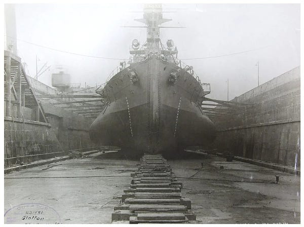HMS Glatton in drydock in Newcastle, seen from the bow. The massive torpedo bulges give the impression that the ship has melted and slowly spread out like a candle in the hot sun. It also looks uncommonly like the pictures you see of the blobfish...