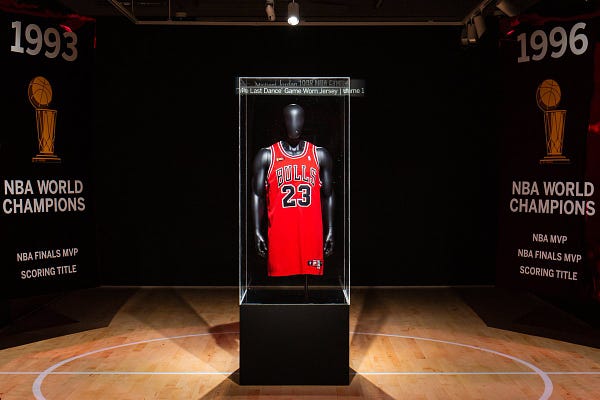 Michael Jordan's 'Last Dance' jersey fetches record $10.1m - BBC News