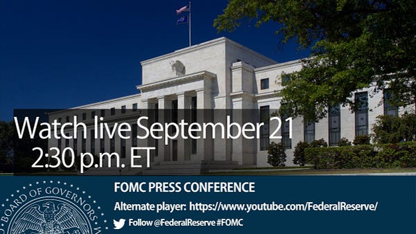 A photo of the Federal Reserve Board Eccles Building with Watch live September 21, 2:30 p.m. ET. Above a blue banner with a partial image of the Federal Reserve Board’s official seal on the left with FOMC Press Conference, Alternate Player: https://www.youtube.com/FederalReserve/, Follow @FederalReserve #FOMC on the right.